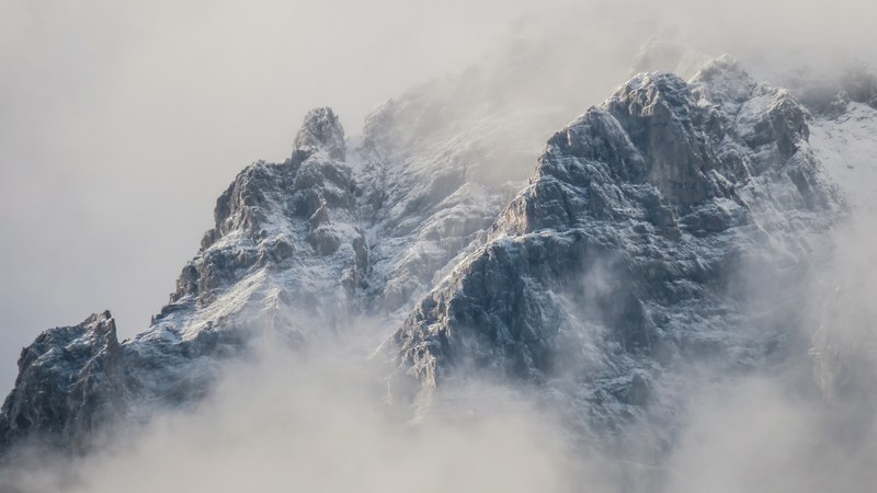 misty alps and snowy mountains on a foggy day in innsbruck, innsbruck mountain under fog 4k
