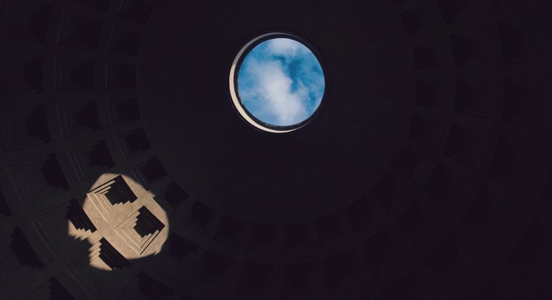 blue sky seen through the oculus in the concrete dome of the roman pantheon, sky in a dome oculus 4k