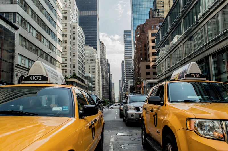 yellow taxis stopped in a busy street in new york city traffic, on my way to work 4k