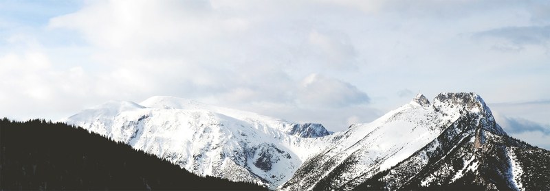 a breathtaking view on a mountain slope covered with a thick layer of snow, snow white slope 4k
