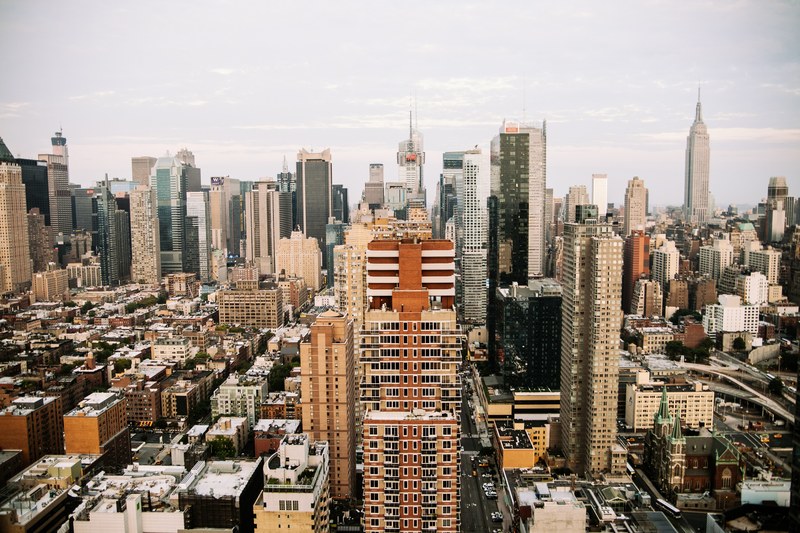 the new york city skyline and skyscrapers on a cloudy day, the big apple 4k
