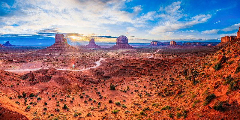 aerial drone shot of red deserts of oljato monument valley, surreal sunrise in the desert 4k