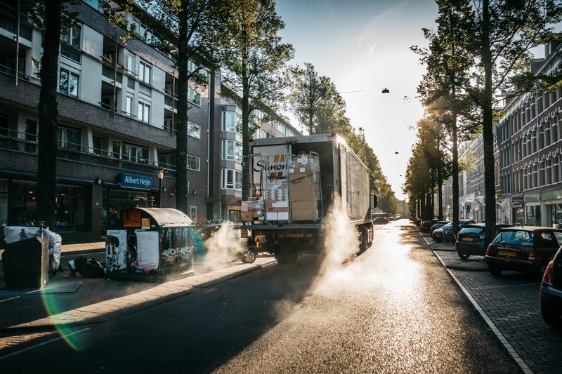 delivery truck parked in the center of the road at sunrise, delivery truck at sunrise 4k
