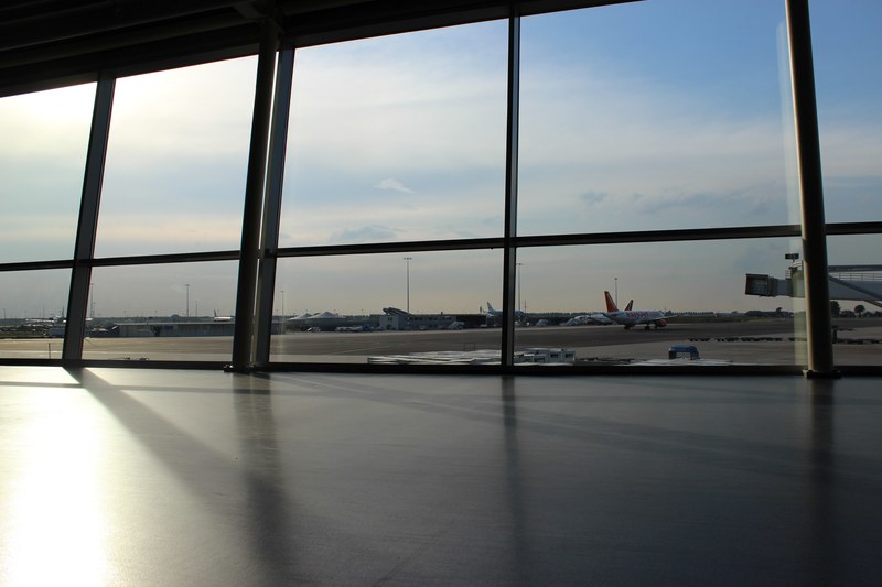 airport window glass and airplane 4k