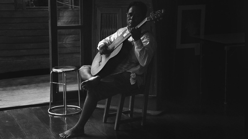 lonely human man and guitar 4k