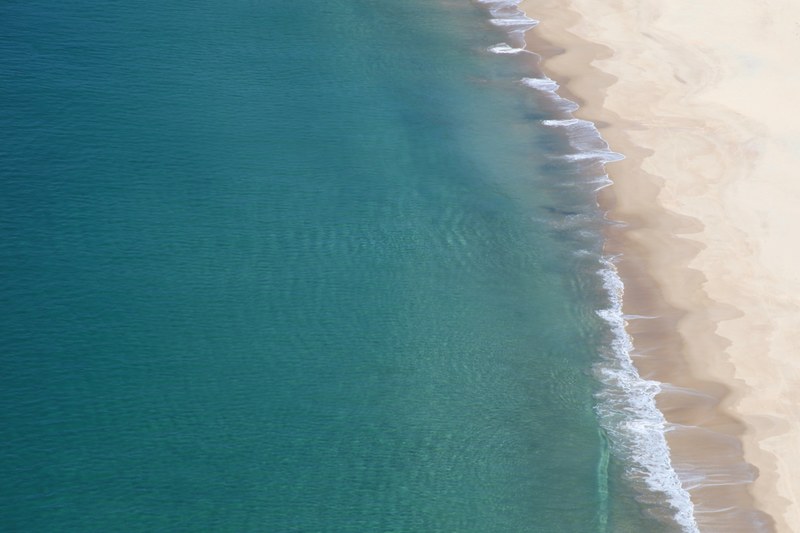 drone aerial view of the zenith sand beach shoreline, zenith beach drone view 4k