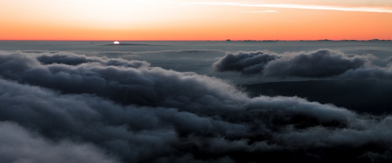 sun sets along grey clouds in snka, cloudy sunrise 4k