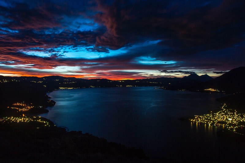 night scene with illuminated sky over lake atitln in san pedro la laguna, san pedro la laguna night 4k