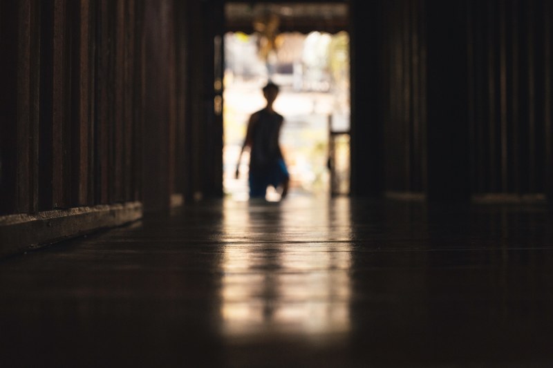 person silhouette light and doorway 4k