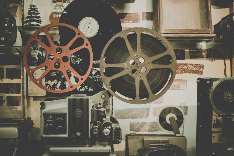 old video tapes and vinyl records on the wall, cinematographers room 4k