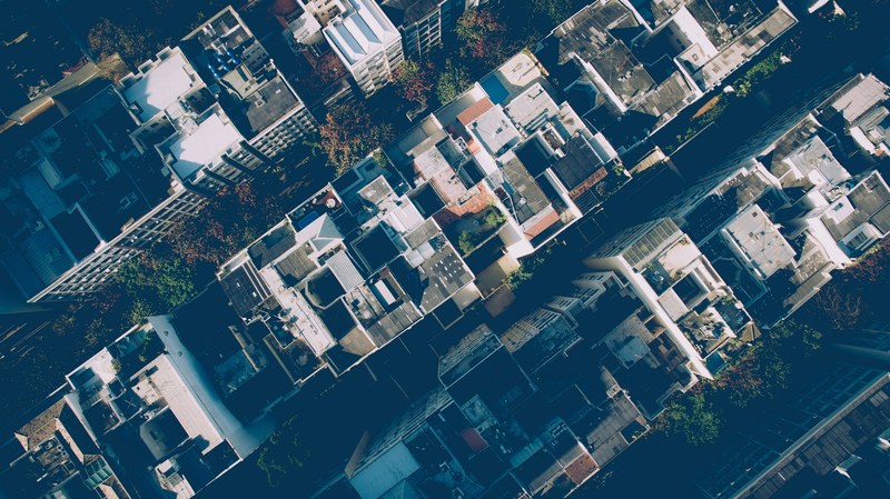 a drone shot of the roofs of residential buildings in ipanema, residential building roofs 4k