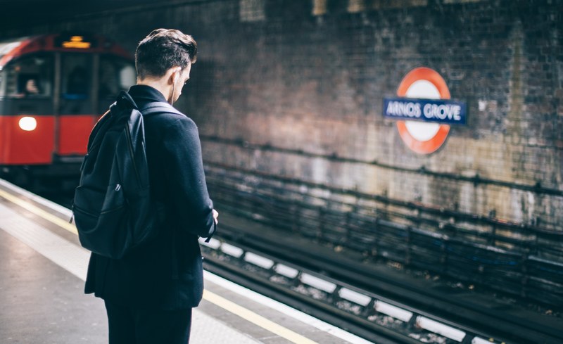 a person waits on a subway platform for an approaching train in arnos grove, waiting for my train 4k