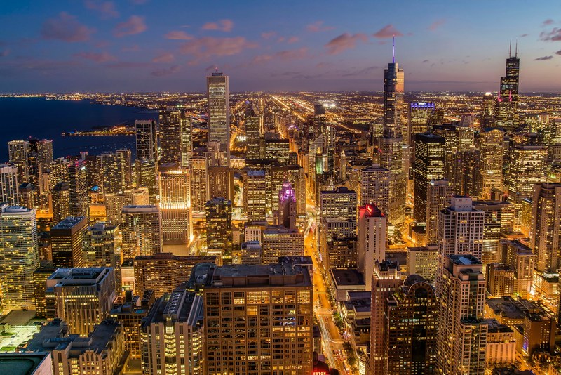 a cityscape of chicago with bright lights and neons on an evening, chicago lights 4k