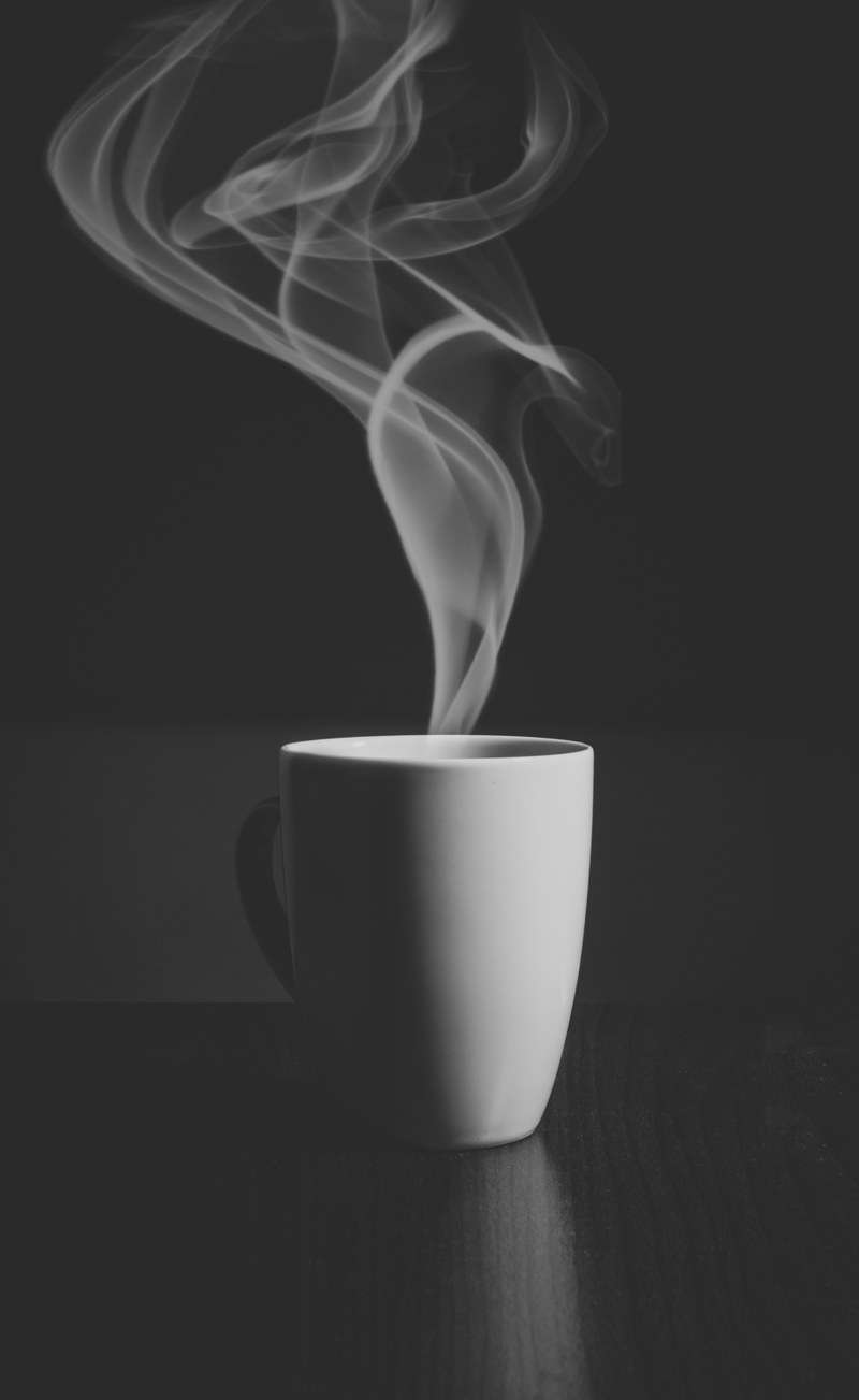 a hot drink in a white cup with steam rising into the air, _steaming hot beverage 4k