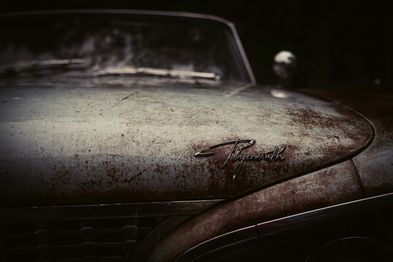 a front view macro shot of a rusty vintage plymouth car, _rusty vintage car 4k