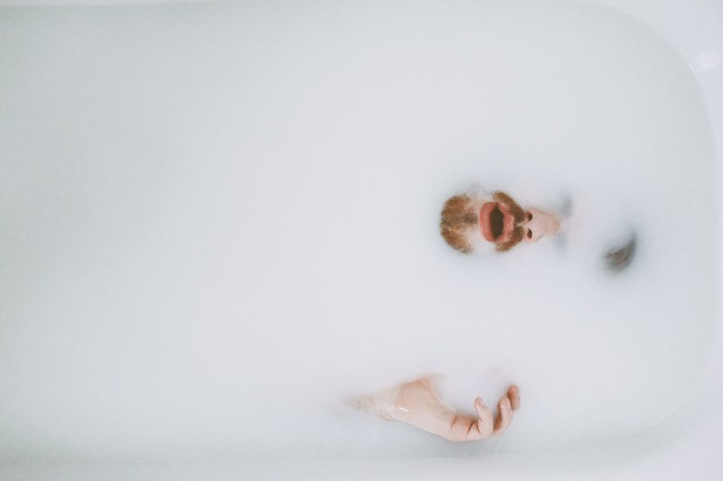 water drowning man and milk 4k