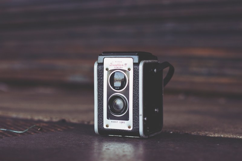 an old and vintage black kodak camera with kodet lens, vintage black kodak camera 4k