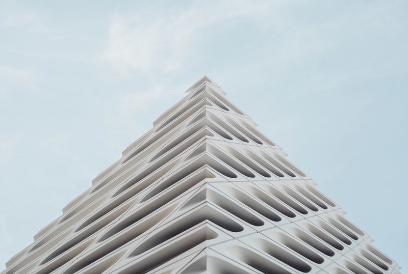 the top edge of an oddly shaped white facade, abstract white facade edge 4k