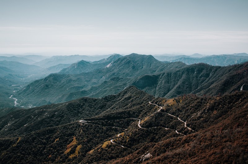 zigzagging roads on wooded mountains in sequoia national park, zigzagging mountain roads 4k