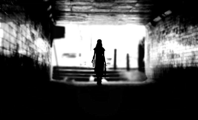black and white shot of lone woman silhouette walking through brick wall tunnel dadar, woman in dadar tunnel 4k