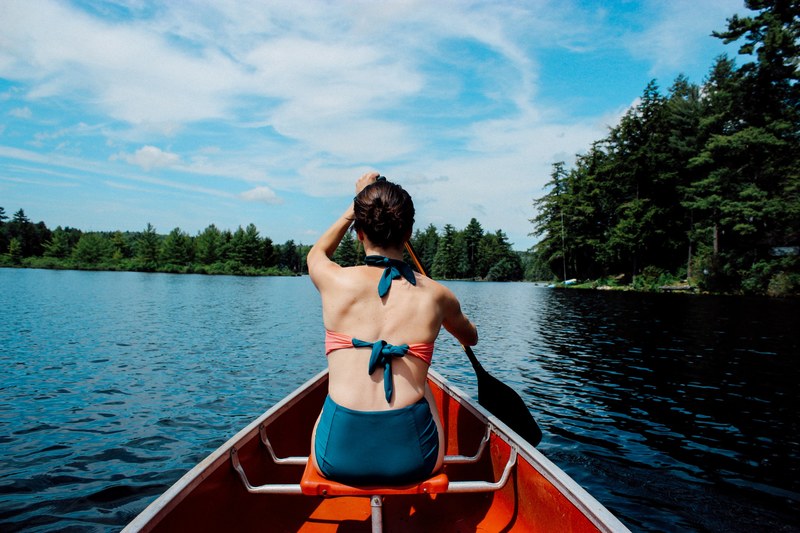 water paddle woman and canoe 4k