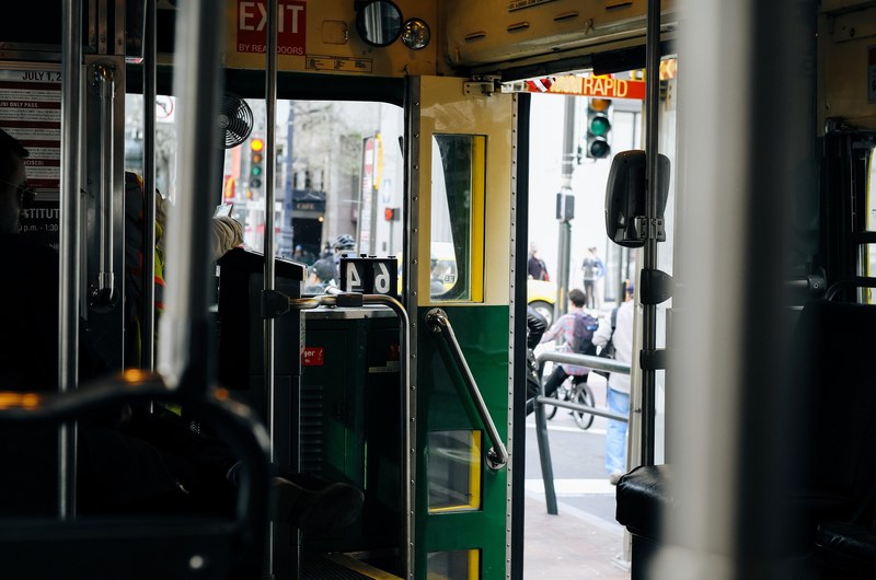 the front of a public transport bus with its door open, san francisco bus front 4k