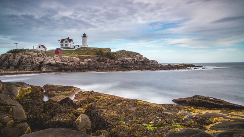 lighthouse ocean rock and water 4k
