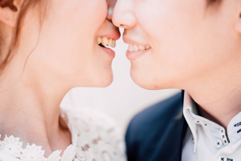 a male and female smiling while embracing for a kiss, _male and female kissing 4k
