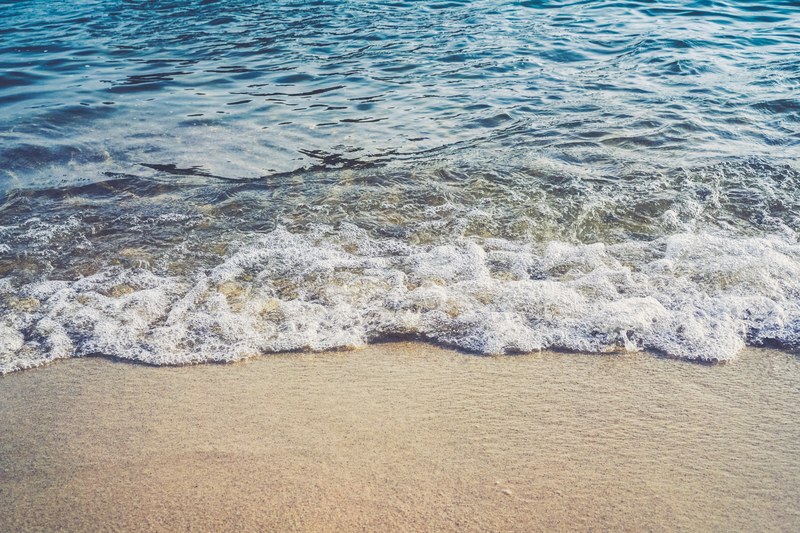 sand beach wafe and water 4k