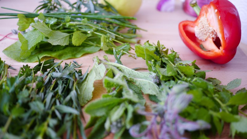 freshly chopped herbs and vegetables on a cutting board, fresh herbs 4k