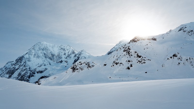 a wintry landscape with rugged peaks under a deep snow cover in solda, wintry mountain landscape 4k