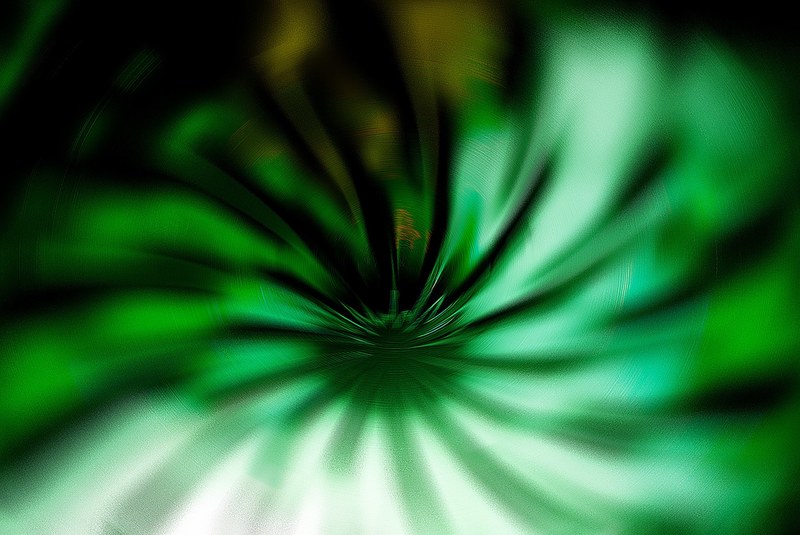 an abstract flower like shape in green, green whirling pattern 4k
