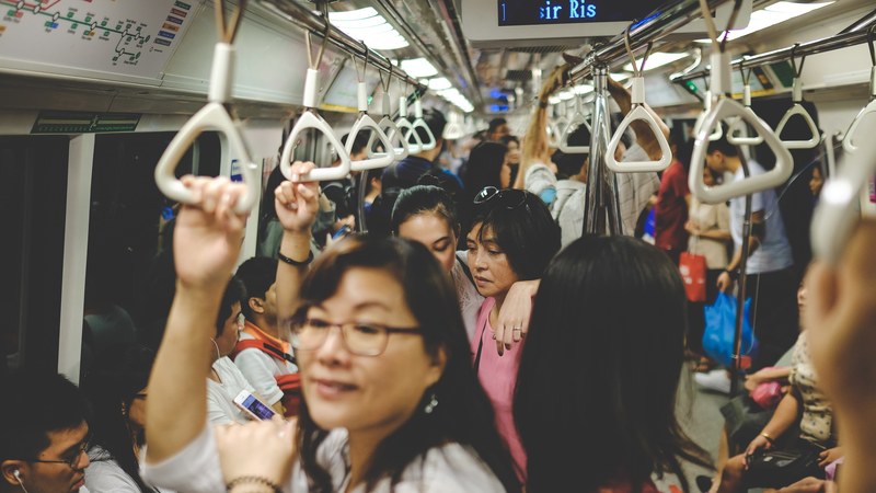 passengers on a crowded subway train, subway train at rush hour 4k