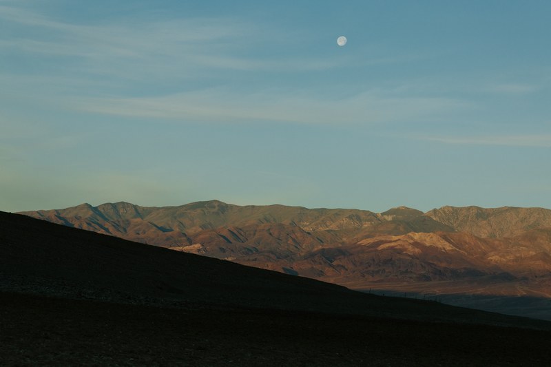 the moon over the hill in the death valley national park, moon over death valley 4k