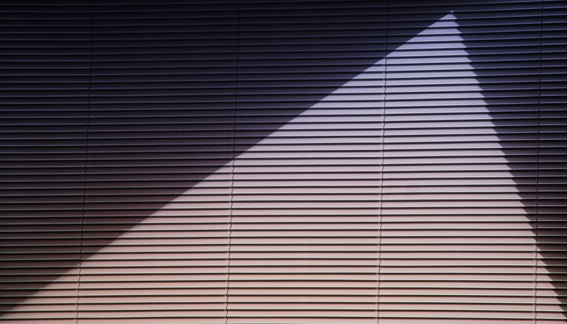 a shot of a geometric shadow on architecture in dubai, dubai building shadow 4k
