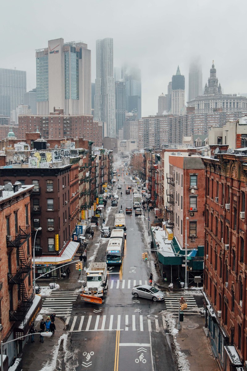 aerial view of morning traffic and skyscrapers in on foggy new york day, nyc winter 4k