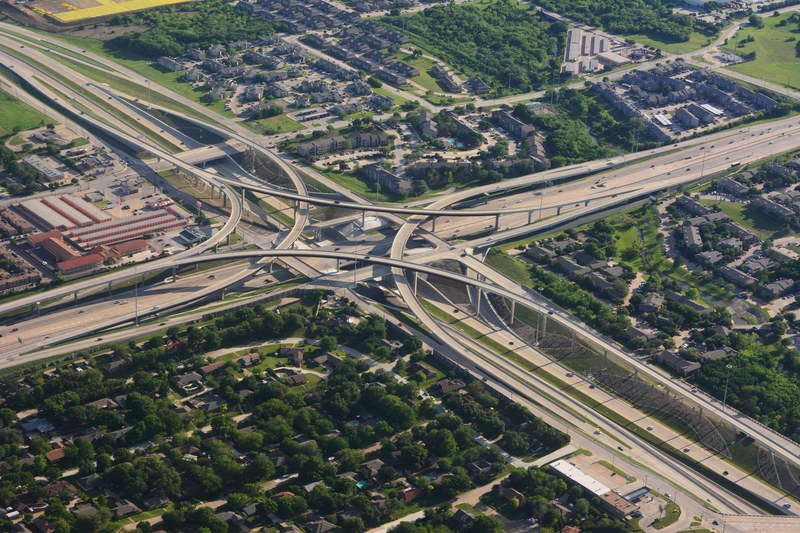 drone view of a busy highway and buildings, drone view of highway 4k