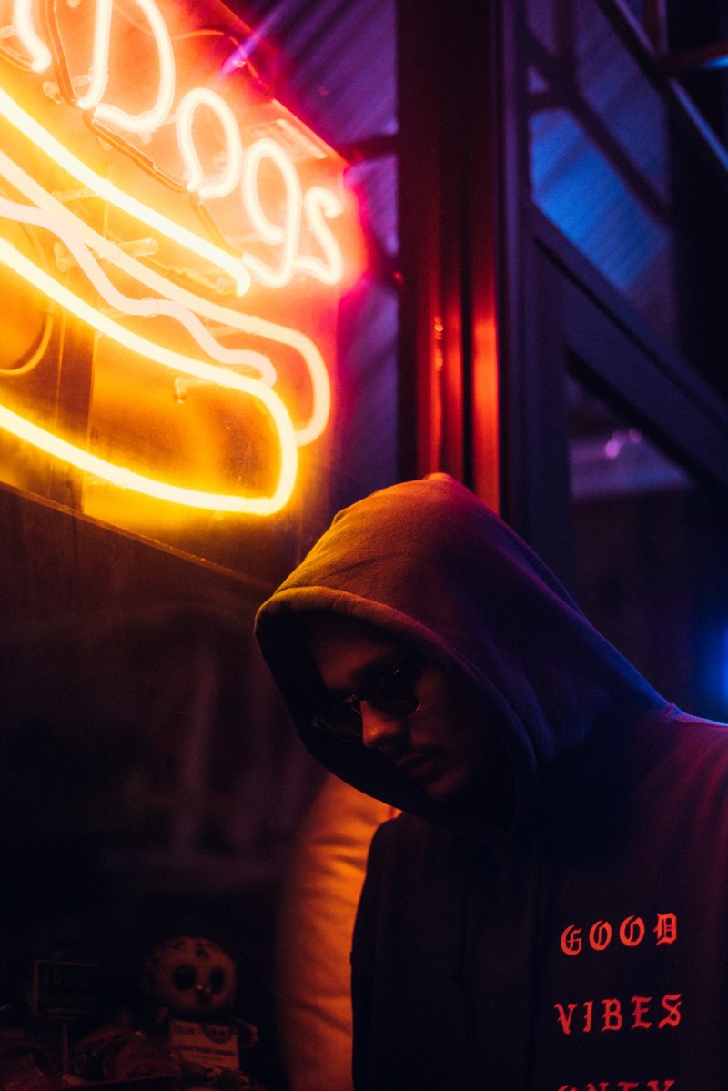 man in hoodie at night 4k