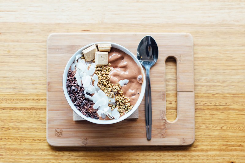 flat lay of healthy breakfast bowl with grains and yogurt, smoothie bowlin 4k