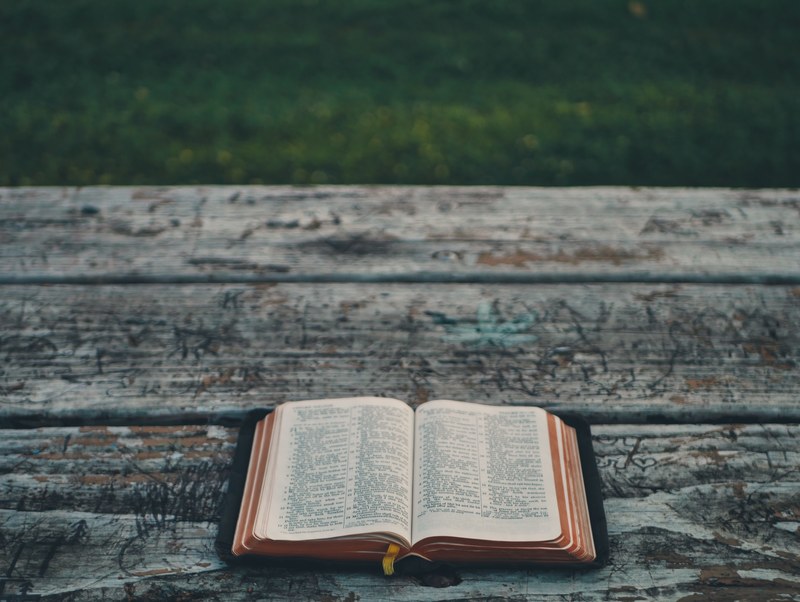 bible read book and picnic table 4k