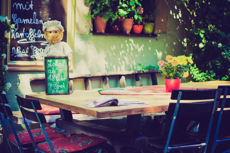 empty table with a menu sign at a cozy family restaurant, cozy family dining 4k