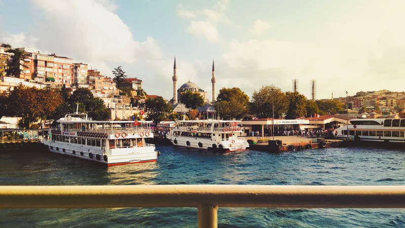 three boats lined up by a pier in istanbul turkey, boats by pier in turkey 4k