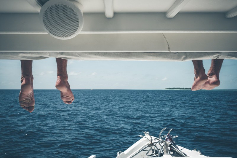 vacation feet barefoot and boat deck 4k