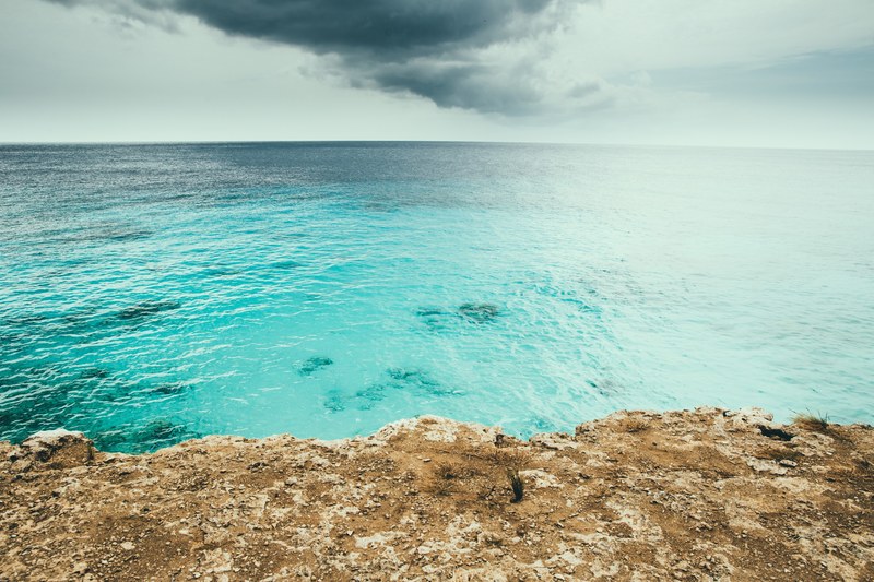 seascape of the ocean by the rocky coast at caribbean netherlands, ocean horizon view 4k