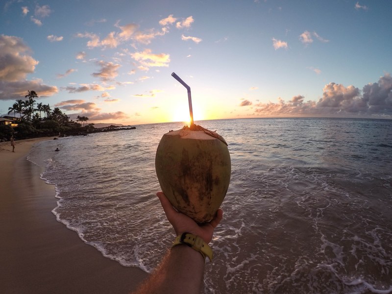 drinking with a straw out of a fruit in hawaii, _fruit bottle straw hawaii 4k