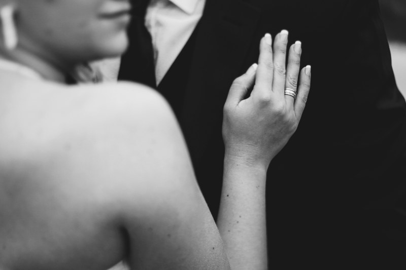 black and white hand on chest ring and hand 4k