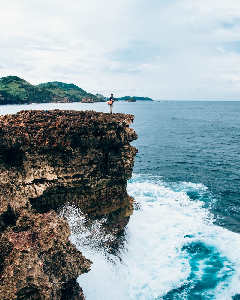 wave rock cliff and sea hd, 4k