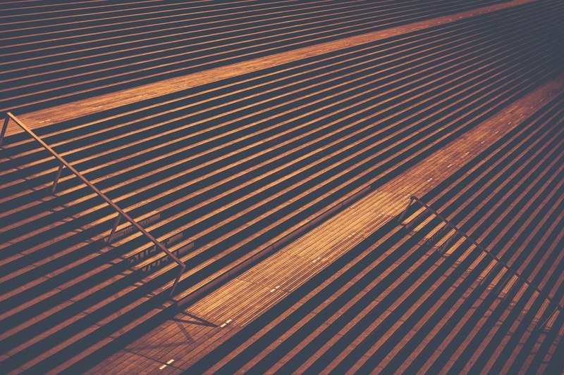 multiple stairs with a single handrail and shadows, stairs on a winter night 4k