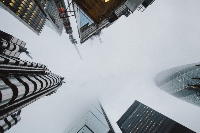 skyscrapers rising towards the foggy sky in london, foggy london skyscrapers 4k