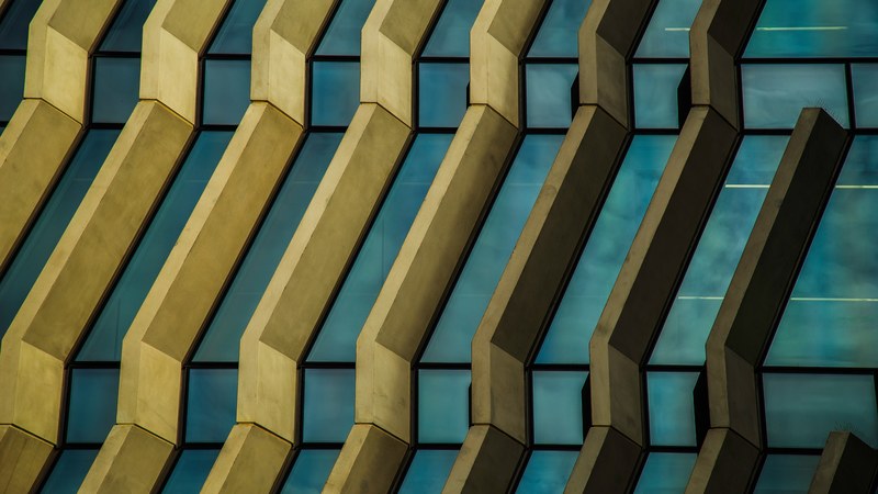 yellow ribs in a blue building facade, yellow and blue architecture 4k